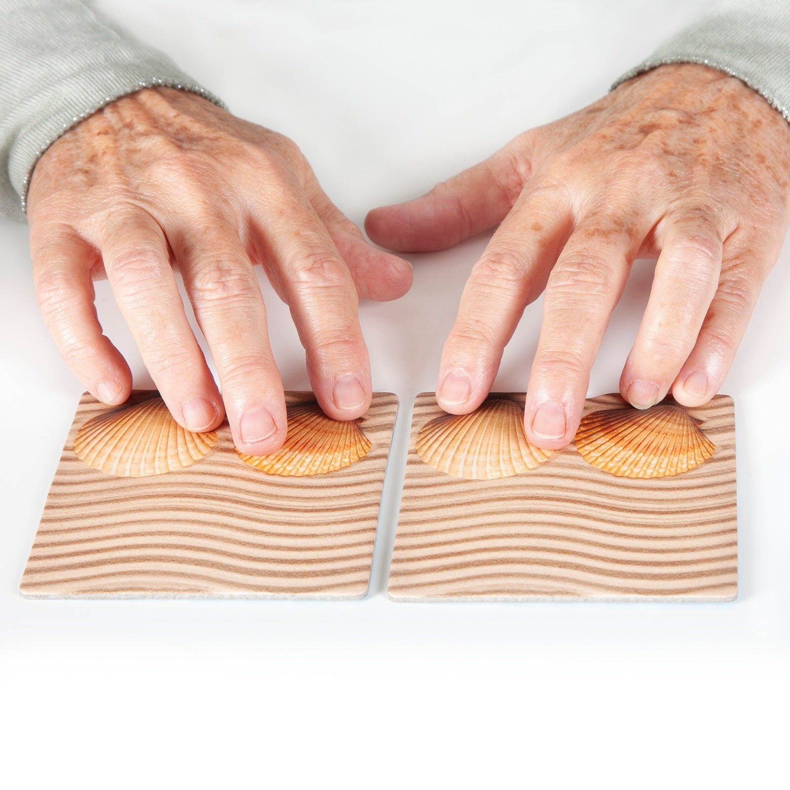 Memo Textuur Natuur – Gevoelsmemo met natuurlijke texturen, stimuleert tastzin en geheugen bij senioren.