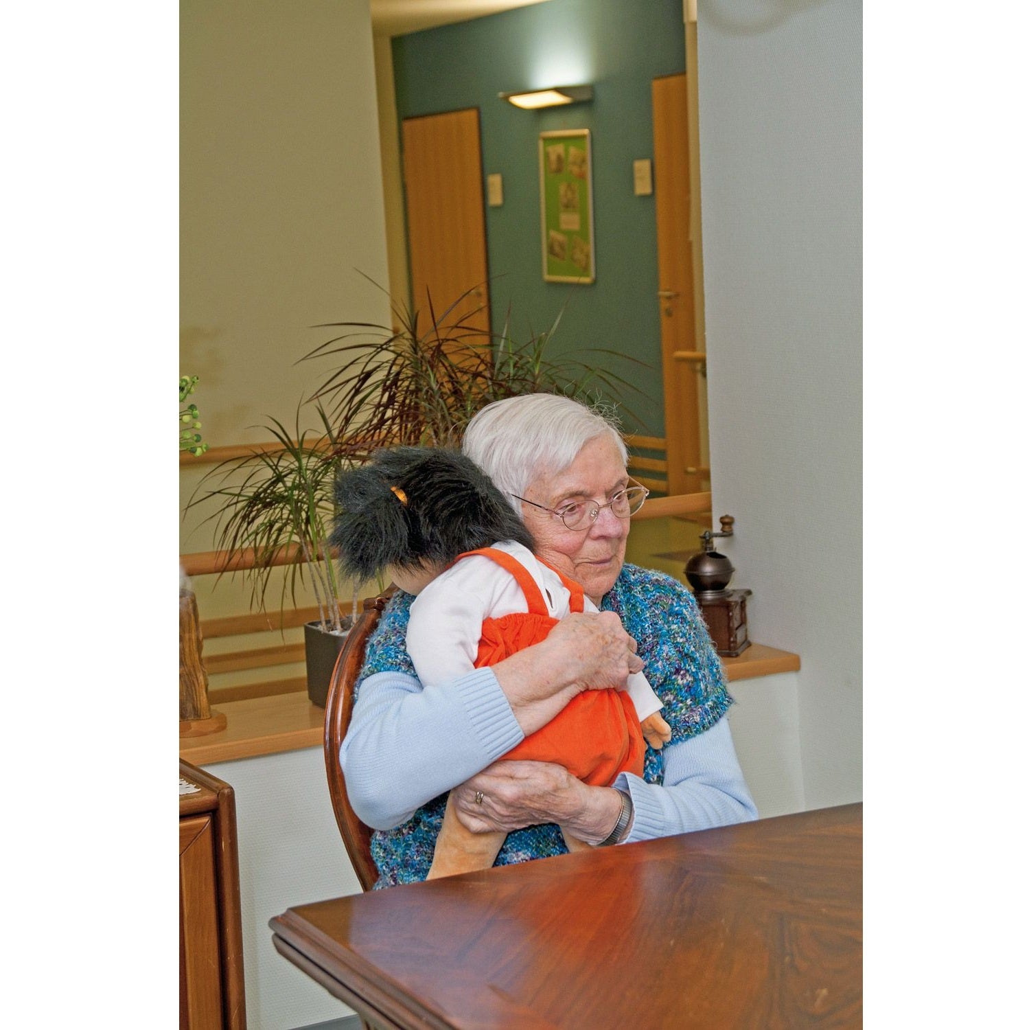 Afbeeelding van het spel Empathiepop Emelie, speciaal geselecteerd  voor ouderen met dementie.